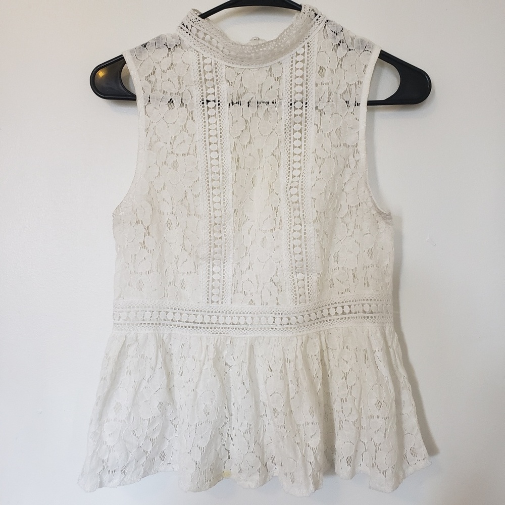 White lace peplum collared sleeveless shirt